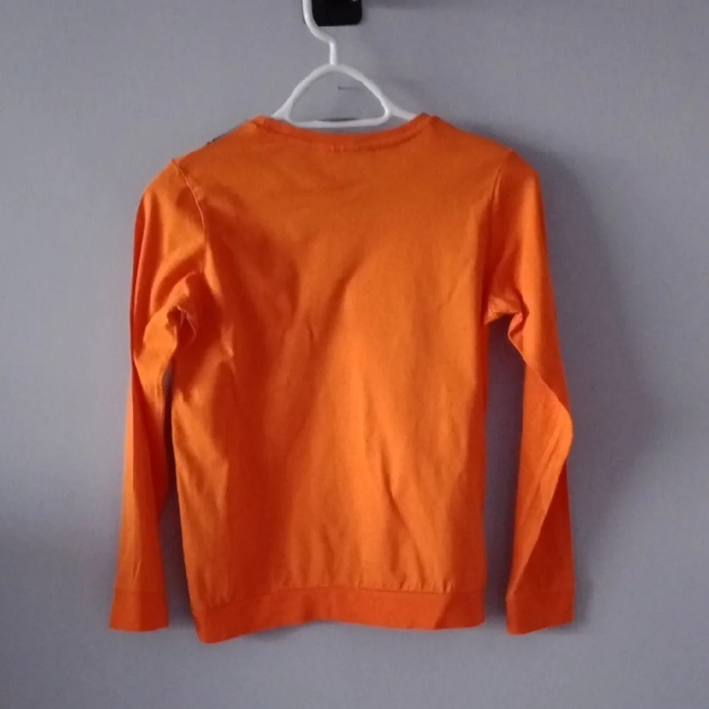 Bright Orange Long Sleeve Tee with Festive Design - Picture 5 of 6